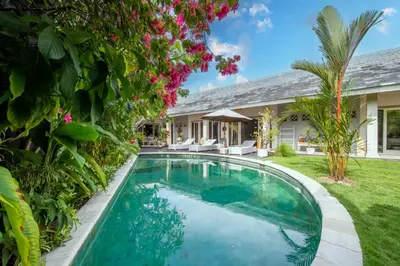 a swimming pool in the backyard of a house at Villa Armani Seminyak in Seminyak
