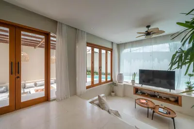 a living room with a flat screen tv at Alegria de la Vida in Canggu