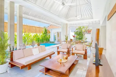 a living room with a couch and chairs and a table at PROMO 3BD Tropical Villa in Central Umalas in Canggu