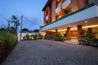 a building with a driveway in front of it at Aralea Coliving in Denpasar