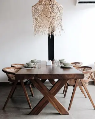 a dining room table with chairs and a chandelier at TropicalLoft With Ocean View From Rooftop -RARE! in Canggu