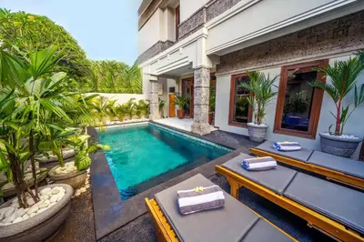 an image of a swimming pool in a villa at Villa MARIE - KUTA - 6 Bedroom 4 Bathroom Villa - Great Location ! in Kuta