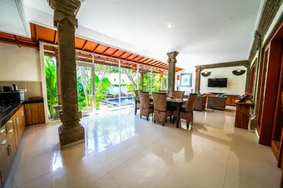a kitchen and dining room with a table and chairs at Villa CONOR - LEGIAN - SEMINYAK - 2 Bedroom 2 Bathroom Villa - Great Location in Seminyak