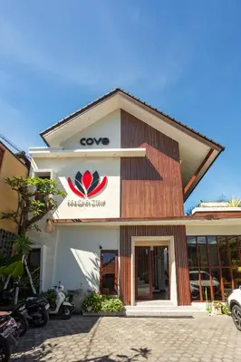 a building with a cvp sign on the front at Cove Ransha Stay in Sanur