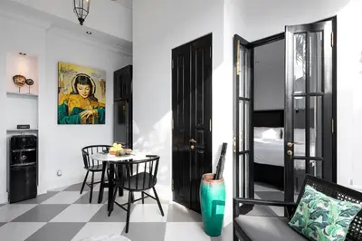 a living room with a table and a couch at Martini Beachside Villa 4 in Canggu