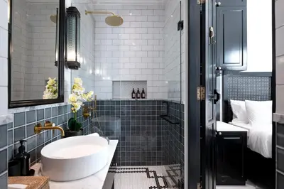 a bathroom with a sink and a shower with a tub at Martini Beachside Villa 4 in Canggu