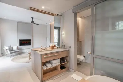 a bathroom with a sink and a mirror at Sin Nombre Bali - Sauna, Ice Bath & Roof Terrace in Canggu