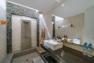 a bathroom with a sink and a shower at Villa Kalila: Elegant 2 BR Villa in Perfect Location ! in Seminyak