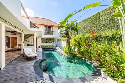 a pool in the backyard of a villa at Villa Ku Tama by Villa Finder in Seminyak