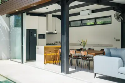a kitchen and dining room with a table and chairs at Villa Vantage 7 - Outstanding 3 BR Villa - Great Location! in Canggu