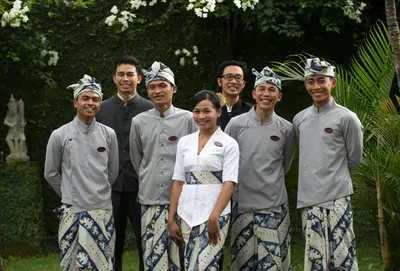 a group of people posing for a picture at Villa Samuan in Seminyak