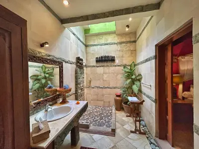 a bathroom with a sink and a shower at The Chand Villa - A Hidden Gem in Petitenget in Seminyak