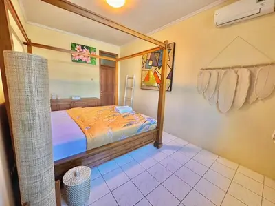 a bedroom with a bed in a room at kuta 5BR private villa pool ,near airport, in Kuta