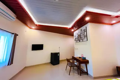 a room with a table and a ceiling at Mora Residence Jimbaran in Jimbaran