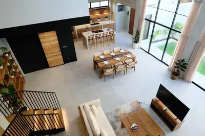 an overhead view of a living room with a table and chairs at Manresa Villa Bali 3 in Canggu