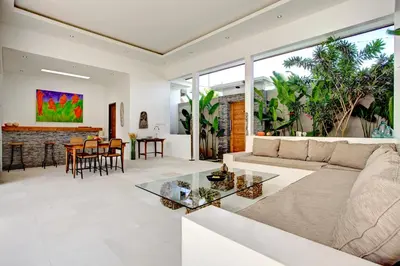 a living room with a couch and a table at Villa Jonas seminyak Bali in Seminyak