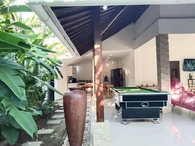 a pool table in a living room with a pool table at 2BR private villa in Seminyak, Ayu Putri in Seminyak