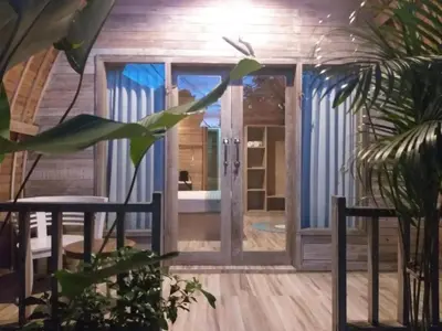 a front door of a house with a porch at Villa Lumbung Krobokan in Seminyak