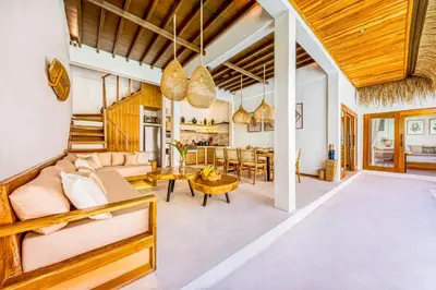 a living room with a couch and a table at Villa Waikiki - Brand New 4BDR with huge Pool in Seminyak