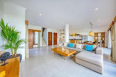 a living room with a couch and a table at Freshly Renovated 3 BD Homey Central Villa in Seminyak