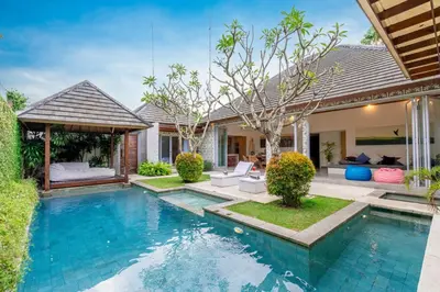 a swimming pool in the backyard of a house at Villa Becca 4 Bedroom at Seminyak near to the Beach in Seminyak
