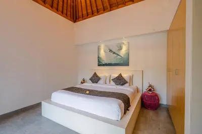 a bedroom with a large bed in a room at Villa Becca 4 Bedroom at Seminyak near to the Beach in Seminyak