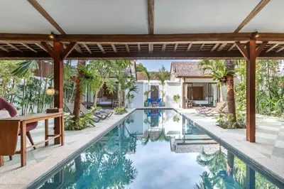 an image of a swimming pool in a villa at Villa Gambar - Comfortable Modern Mix 3BR Villa with Large Private Pool, 10 Minutes to the Beach in Canggu
