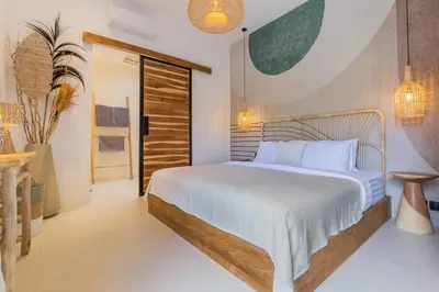 a bedroom with a large bed in a room at Seminyak Dream 1 bedroom villa with private pool in Seminyak