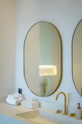 a bathroom with a sink and a mirror at Casa Donilo - 4BR Designer Villa in Canggu in Canggu