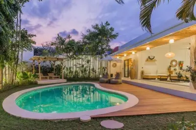 a pool in the backyard of a house at Villa Alamanda Livia Seminyak Design spacious 2bdr and private pool in Seminyak