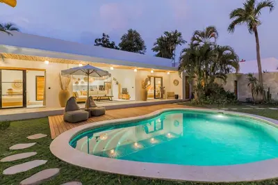 a swimming pool in the backyard of a house at Villa Alamanda Livia Seminyak Design spacious 2bdr and private pool in Seminyak