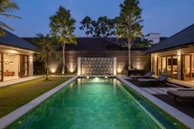 a swimming pool in the backyard of a house at Villa 500m2 with 14m Pool, BBQ, Pinball - Seminyak in Seminyak