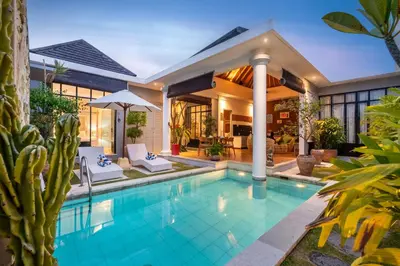 a swimming pool in the backyard of a house at Villa Vaiana Seminyak in Seminyak