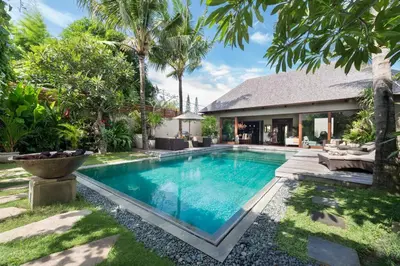 a swimming pool in the backyard of a villa at Eshara 1 our Tropical & luxury 3BR Villa 450m from beach in Seminyak