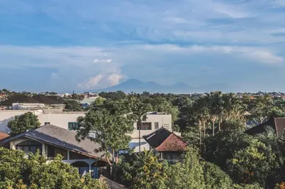 a view of a city with trees and buildings at The Revery Bali in Canggu