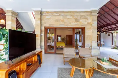 a living room with a large flat screen tv at Viona 3 Villa - 3 BDR villa, walk to the beach in Seminyak