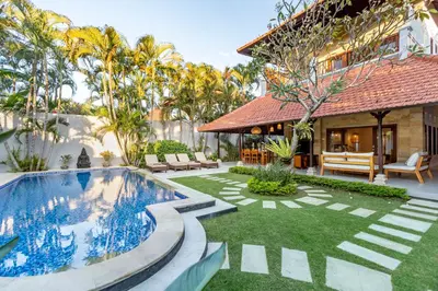 an image of a backyard with a swimming pool and a house at Viona 3 Villa - 3 BDR villa, walk to the beach in Seminyak