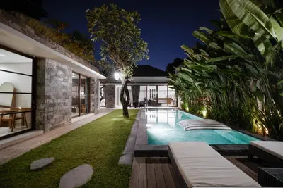 an image of a swimming pool in the backyard of a house at Villa Duadewi 4BR in the Heart of Seminyak by Santi Management in Seminyak