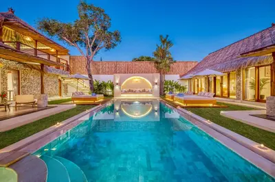 a swimming pool in the backyard of a house at Villa Miami - New Luxury 7BDR Prime Location in Seminyak