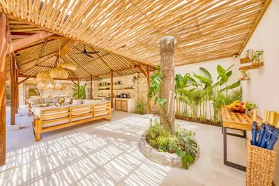 an outdoor living room with a wooden ceiling at Villa Miami - New Luxury 7BDR Prime Location in Seminyak
