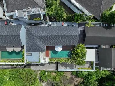 an overhead view of a house with a swimming pool at Blanc Mediterranean: 3BR in Central Canggu in Canggu