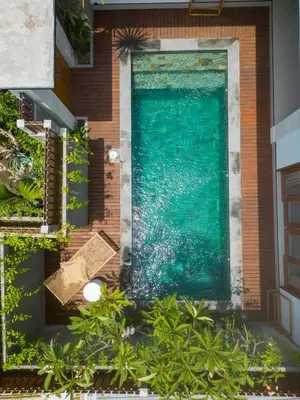 an overhead view of a swimming pool on a house with plants at Sundaze 2 - Canggu Paradise with Pool and Kitchen Brand NEW in Kerobokan