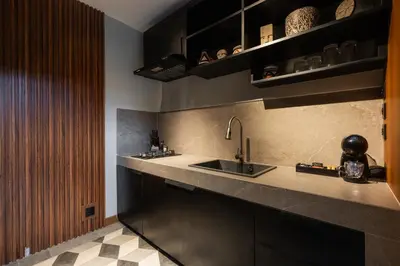 a kitchen with a sink and a counter at Villa Zazu in Seminyak