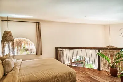 a bedroom with a bed and a balcony at Gorgeous Mediterranean Style 2 Bed, Top Pick! in Canggu