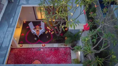 an overhead view of a room with a red carpet and plants at The Light Exclusive Villas and SPA in Seminyak