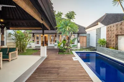 an external view of a villa with a swimming pool at 2 Bedroom Villa private Pool and BBQ Seminyak Bali in Seminyak
