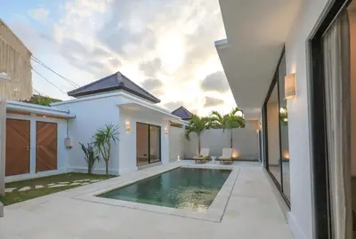 a swimming pool in the backyard of a house at Villa Isea-3 bedroom with pool in Seminyak