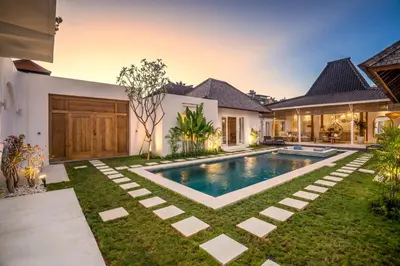 a swimming pool in the backyard of a house at Villa Passion by Alfred in Bali in Seminyak