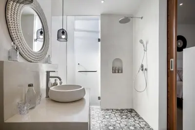 a white bathroom with a sink and a mirror at Villa Passion by Alfred in Bali in Seminyak