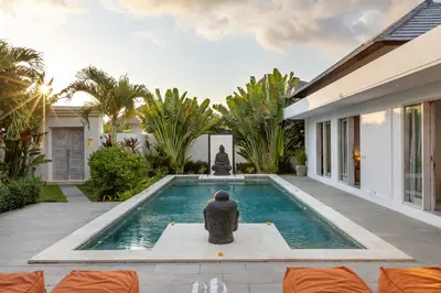 a swimming pool in the backyard of a house at Wonderful 4Br Villa in Seminyak in Seminyak